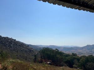 a view of the mountains from the top of a hill at Vista Royale Luxury Villas in Mbabane +46 photos