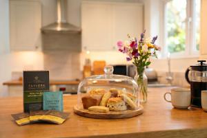 a display of food in a glass dish on a table at Willow Cottage in Pateley Bridge