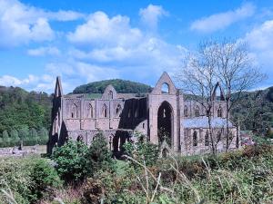 an old stone church in the middle of a field at Foxes Reach - Hw7421 in Trelleck