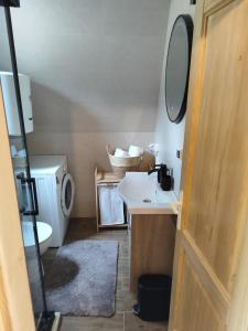 a bathroom with a sink and a toilet and a mirror at Villa Moonlight,Žabljak in Žabljak +20 photos
