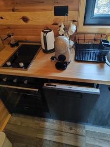 a kitchen counter with a coffee maker on it at Villa Moonlight,Žabljak in Žabljak