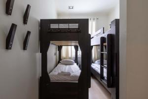 a small room with two bunk beds in it at Central Stylish Retreat with Sauna in Åre