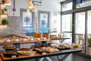 a buffet with many different types of food on display at Glamping -420 in Kalia +50 photos