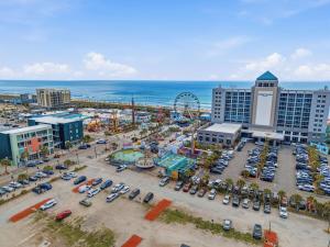 an aerial view of a city with a parking lot at Carolina Beach Ocean Playground in Carolina Beach