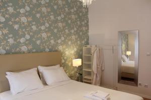 Postel nebo postele na pokoji v ubytování The Sky Lofts Lisbon - Guesthouse