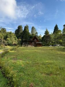 a house in the middle of a field at Chalet Amar in Mazo
