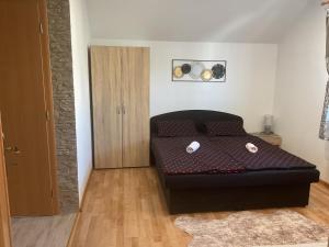 a small living room with a couch in a room at Homestay Renata in Nová Lesná