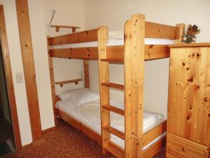 a couple of bunk beds in a room at Tannenblick Loppin EG in Jabel