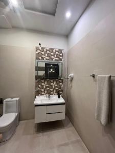 Kupatilo u objektu Palmtree Hotel