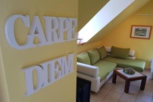 a living room with a couch and a table at Fair-Play App 04 DG R in Göhren-Lebbin