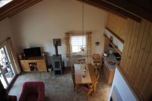 an overhead view of a kitchen and a living room at Ferienhaus Jabel 29 in Jabel