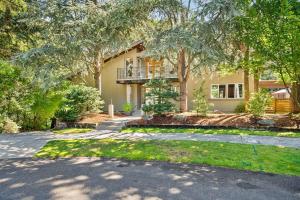 a large house with a porch and a driveway at Dash Point Modern in Tacoma