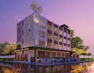 a rendering of a hotel with cars parked in a parking lot at Hotel Cloud by ARIENA in Phundardih