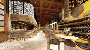 a restaurant with a bar with chairs and wine racks at InterContinental Jerusalem by IHG in Jerusalem