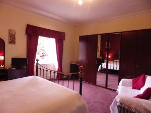 Postel nebo postele na pokoji v ubytování Sorbietrees B&B