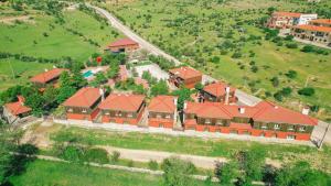 an aerial view of a large house with red roofs at Complejo rural el Hosquillo Serranía de Cuenca in Cuenca