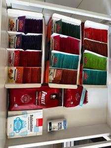 a refrigerator filled with lots of different types of food at Bright apartment in Haslum in Haslum 