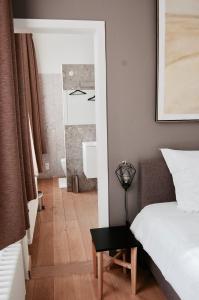 A bed or beds in a room at de Voorplaats