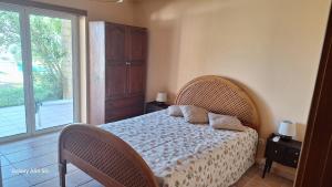 a bedroom with a bed and a large window at Villa Gomes Pedro in Tomar +55 photos