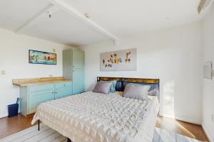 a bedroom with a large bed in a room at Poolside Oasis! Phoenix Group Sanctuary w/ Patio in Phoenix +25 photos