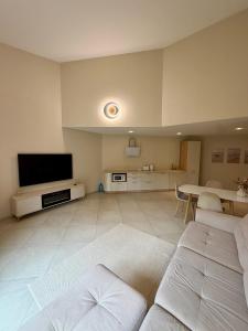 a large living room with a flat screen tv at Männimetsa in Narva-Jõesuu