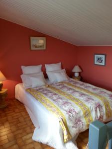 En eller flere senge i et værelse på La Petite Maison de Marie Louise
