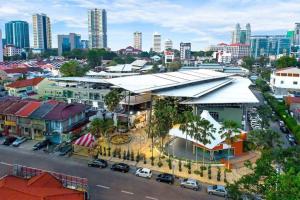 an aerial view of a city with buildings at Georgetown Kyash House 23 in George Town