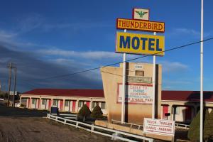 a motel sign in front of a motel at Thunderbird Motel Las Vegas/ New Mexico in Las Vegas