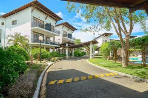 a winding road in front of a building at Hideaway in Paradise in Juan Dolio