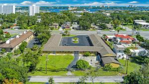 an aerial view of a house with a parking lot at Lumina Motel in Daytona Beach +14 photos