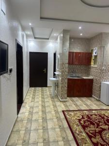 a large bathroom with a sink and a toilet at جوهرة عسير in Abha +13 photos
