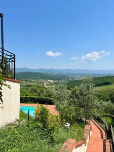a view of a swimming pool from a house at Mugello View in Bovecchio