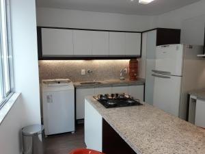 Кухня або міні-кухня у Apartamento em Copacabana