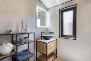 a bathroom with a sink and a mirror at Басейн Чан с Джакузи Дом Посуточно Осокорки Киев in Kyiv +15 photos