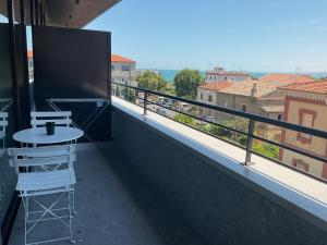 a table and chairs on a balcony with a view at VILLA ACTEA in Vasto