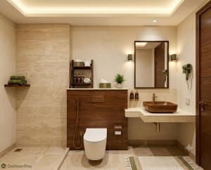 a bathroom with a toilet and a sink at Hotel Mashabrum Skardu in Skardu