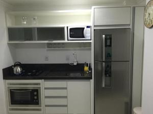 Kuchyň nebo kuchyňský kout v ubytování Residencial Bela Morada
