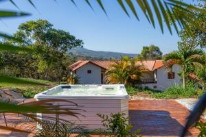 a hot tub in the yard of a house at Casa de Teja Barichara in Barichara +23 photos