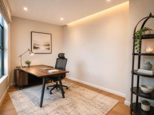 an office with a desk and a chair at Mandala 365 Residential Tower in Ulaanbaatar