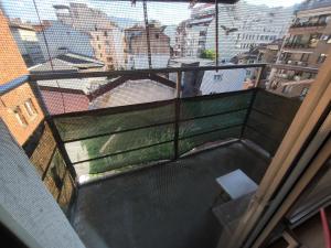 a balcony with a view of the city at Rooms43 in Sofia
