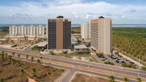 an aerial view of a city with tall buildings at Beach GAV Resorts - Salinópolis - Pará - 01 a 08 de Dezembro ou 11 a 18 de Maio 2027 - Escolha sua data in Salinópolis