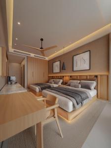 a large bedroom with two beds and a table at Inna Resort & Spa in Puerto Morelos +33 photos
