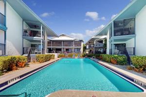 an image of a swimming pool in front of a house at Gulf Place 19 & 20 in Holmes Beach +54 photos
