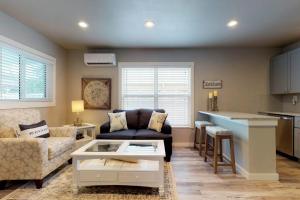 a living room with a couch and a table at South Bay Inn 3 in Anna Maria