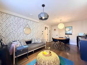 a living room with a couch and a table at Boutique in Vancouver