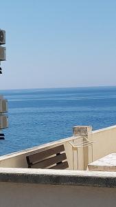 a view of the ocean from the roof of a building at Pogled na more in Pečurice