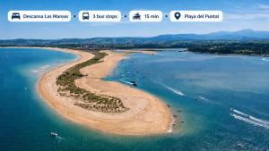 an aerial view of a beach with boats in the water at Descansa Las Mareas in Santander +5 photos