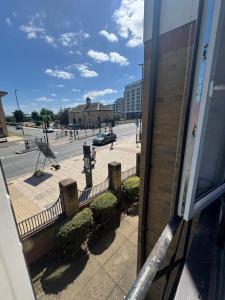 a view of a street from a window of a building at Beautiful Double room in Peterborough