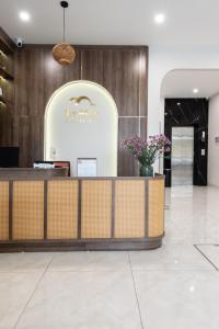 a lobby of a hotel with a reception desk at La May Boutique hotel in Ninh Binh