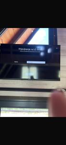 a flat screen tv sitting on top of a shelf at Agin Konak in Gusinje